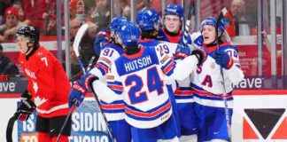 us-hockey-team-triumphs-over-canada-secures-group-win-espn